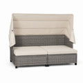 Sofa ogrodowa z technorattanu z kremowym zadaszeniem